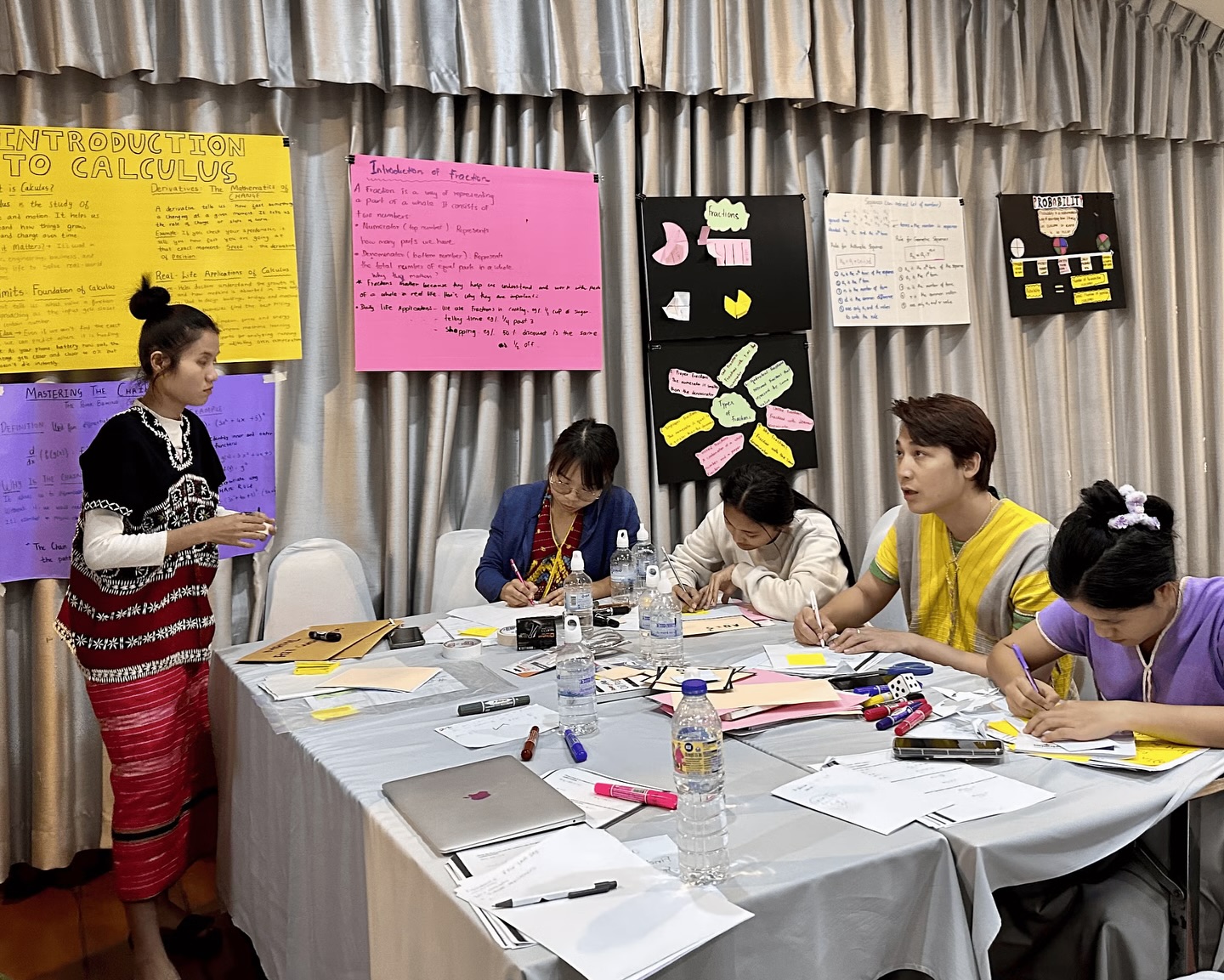 The participants working together during the education workshop in Thailand.